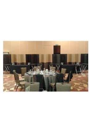 A conference room with foldable partitions set up.