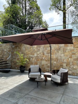 AC8 - NBR TITAN PARASOL BROWN, SF19 - SBR MERLIN OUTDOOR LOUNGE ARMCHAIR & CT21 - M SOLEIL OUTDOOR COFFEE TABLE