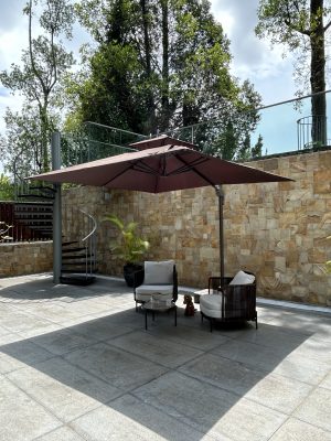 AC8 - NBR TITAN PARASOL BROWN, SF19 - SBR MERLIN OUTDOOR LOUNGE ARMCHAIR & CT21 - M SOLEIL OUTDOOR COFFEE TABLE