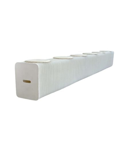 The Kraft Bench - White is a long, rectangular bench with ribbed sides, six circular seat pads on top, and a vertical slot-shaped handle at the end.