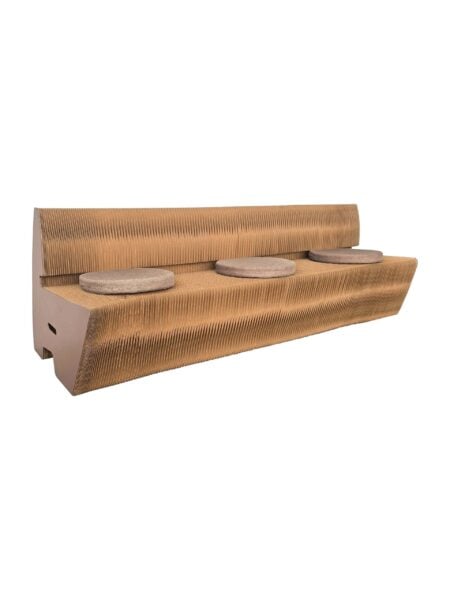 Long, modern bench made of corrugated cardboard with a ridged texture, featuring three round, flat seat cushions evenly spaced on top.