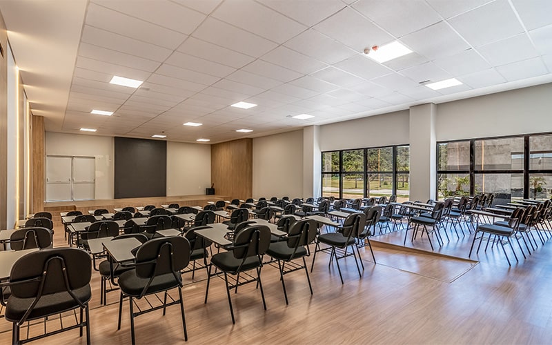 Seminar room furniture arrangement for corporate training and networking.