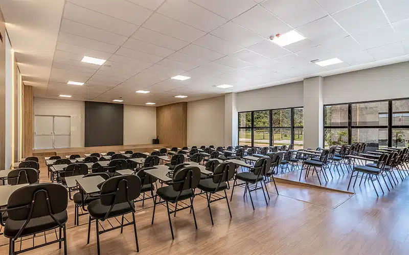 Seminar room furniture arrangement for corporate training and networking.